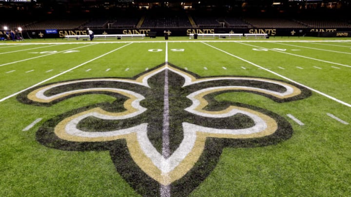 Oct 30, 2022; New Orleans, Louisiana, USA; General view of the New Orleans Saints logo as the midfield logo fleur-de-lis after the game between the New Orleans Saints and the Las Vegas Raiders at Caesars Superdome. Mandatory Credit: Stephen Lew-USA TODAY Sports