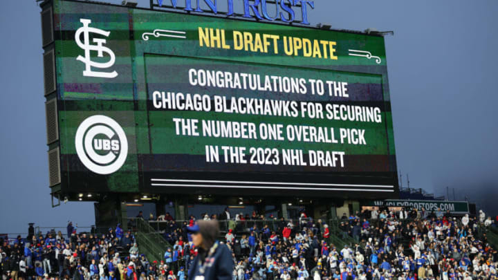 CHICAGO, ILLINOIS - MAY 08: A detail of the video board announcing the Chicago Blackhawks won the NHL Draft Lottery during the between the Chicago Cubs and the St. Louis Cardinals at Wrigley Field on May 08, 2023 in Chicago, Illinois. (Photo by Michael Reaves/Getty Images)