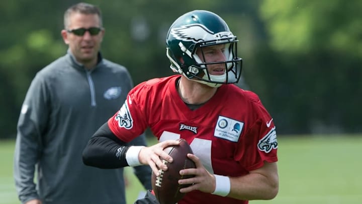 May 24, 2016; Philadelphia, PA, USA; Philadelphia Eagles quarterback Carson Wentz (11) sets up to throw during OTS