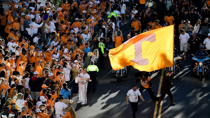 The Volunteer waves a Tennessee flag during the Vol Walk before an SEC football game between Tennessee and Ole Miss at Neyland Stadium in Knoxville, Tenn. on Saturday, Oct. 16, 2021.Kns Tennessee Ole Miss Football