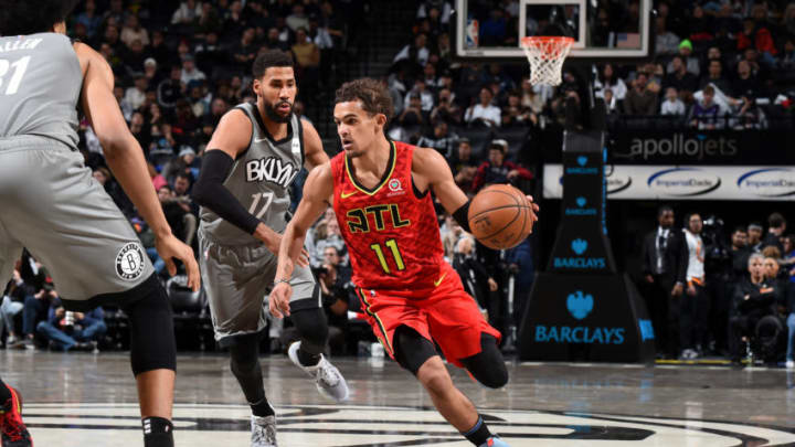 BROOKLYN, NY - DECEMBER 21: Trae Young #11 of the Atlanta Hawks handles the ball against the Brooklyn Nets on December 21, 2019 at Barclays Center in Brooklyn, New York. NOTE TO USER: User expressly acknowledges and agrees that, by downloading and or using this photograph, User is consenting to the terms and conditions of the Getty Images License Agreement. Mandatory Copyright Notice: Copyright 2019 NBAE (Photo by Brian Babineau/NBAE via Getty Images)