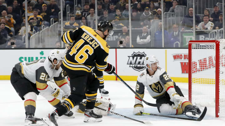 BOSTON, MA – JANUARY 21: Boston Bruins center David Krejci (46) scores the game winner besting Vegas Golden Knights defenseman Nick Holden (22) during a game between the Boston Bruins and the Vegas Golden Knights on January 21, 2020, at TD Garden in Boston, Massachusetts. (Photo by Fred Kfoury III/Icon Sportswire via Getty Images)
