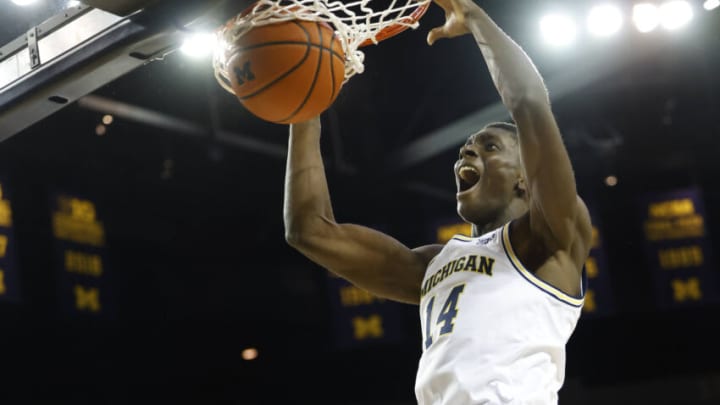 Nov 10, 2021; Ann Arbor, Michigan, USA; Michigan Wolverines forward Moussa Diabate (14) dunks in the first half against the Buffalo Bulls at Crisler Center. Mandatory Credit: Rick Osentoski-USA TODAY Sports