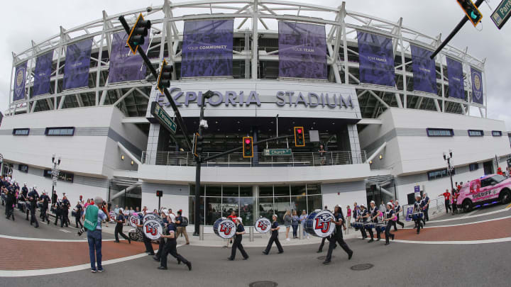 Dec 21, 2019; Orlando, Florida, USA; The Liberty Flames marching band performs during the cancer survivors march to the stadium before the game against the Georgia Southern Eagles at Exploria Stadium. Mandatory Credit: Reinhold Matay-USA TODAY Sports