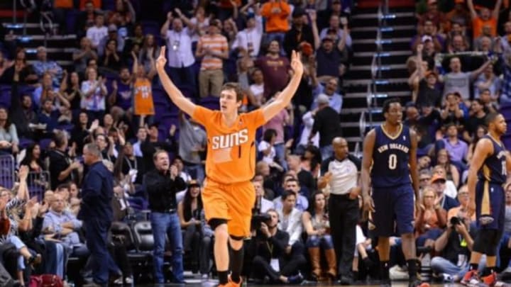 Feb 28, 2014; Phoenix, AZ, USA; Phoenix Suns shooting guard Goran Dragic (1) celebrates a three point basket against the New Orleans Pelicans during the second half at US Airways Center. The Phoenix Suns won the game 116-104. Mandatory Credit: Joe Camporeale-USA TODAY Sports