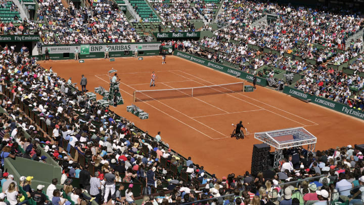 View of the central court during an exhibition match ahead of the Roland Garros 2015 French Tennis Open in Paris on May 23, 2015. AFP PHOTO / KENZO TRIBOUILLARD (Photo credit should read KENZO TRIBOUILLARD/AFP via Getty Images)