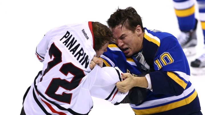 Nov 9, 2016; St. Louis, MO, USA; Chicago Blackhawks left wing Artemi Panarin (72) and St. Louis Blues right wing Scottie Upshall (10) brawl during the third period at Scottrade Center. The Blackhawks won 2-1 in overtime. Mandatory Credit: Billy Hurst-USA TODAY Sports