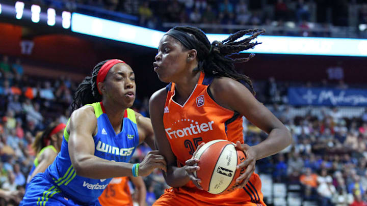 UNCASVILLE, CT - AUGUST 12: Connecticut Sun forward Jonquel Jones (35) defended by Dallas Wings forward Kayla Thornton (6) during the first half of an WNBA game between Dallas Wings and Connecticut Sun on August 12, 2017, at Mohegan Sun Arena in Uncasville, CT. Connecticut defeated Dallas 96-88. (Photo by M. Anthony Nesmith/Icon Sportswire via Getty Images)