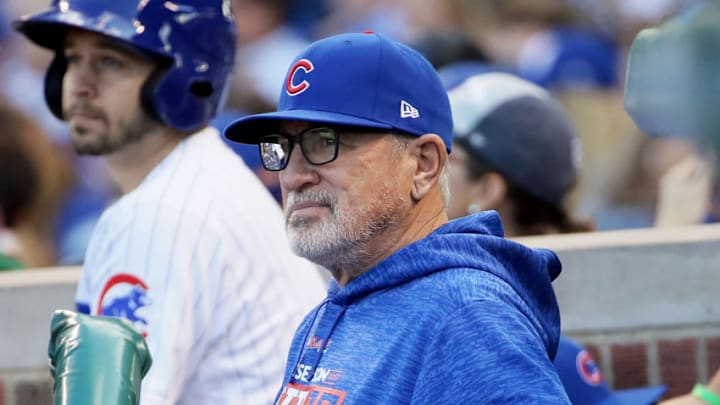 CHICAGO, IL - OCTOBER 09: Manager Joe Maddon of the Chicago Cubs looks on from the dugout in the fifth inning against the Washington Nationals during game three of the National League Division Series at Wrigley Field on October 9, 2017 in Chicago, Illinois. (Photo by Jonathan Daniel/Getty Images)