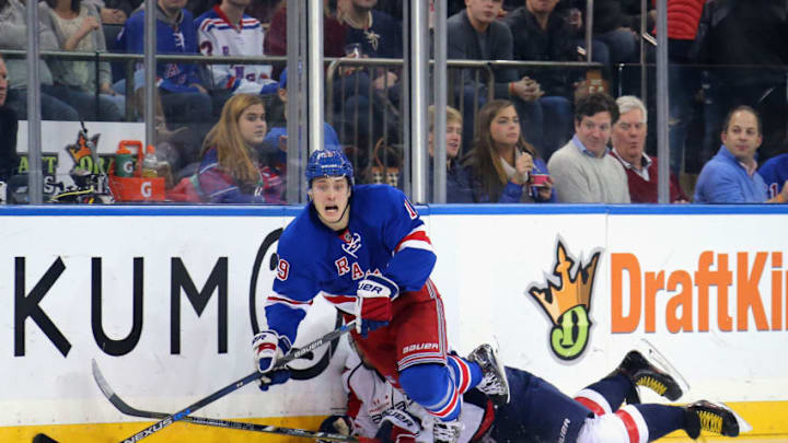 NEW YORK, NY - DECEMBER 20: Alex Ovechkin #8 of the Washington Capitals trips up Jesper Fast #19 of the New York Rangers during the third period at Madison Square Garden on December 20, 2015 in New York City. The Capitals defeated the Rangers 7-3. (Photo by Bruce Bennett/Getty Images)