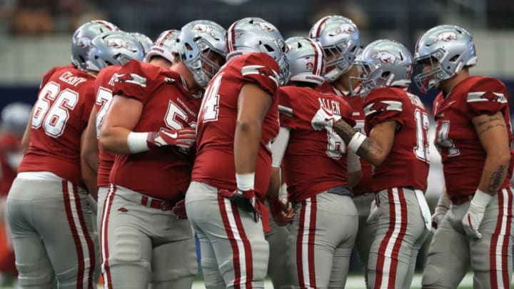 ARLINGTON, TX - SEPTEMBER 23: Austin Allen #8 of the Arkansas Razorbacks huddles the team before a game against the Texas A&M Aggies at AT&T Stadium on September 23, 2017 in Arlington, Texas. (Photo by Ronald Martinez/Getty Images)