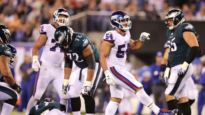 EAST RUTHERFORD, NJ – OCTOBER 11: Olivier Vernon #54 of the New York Giants reacts after sacking Carson Wentz #11 of the Philadelphia Eagles during the third quarter at MetLife Stadium on October 11, 2018 in East Rutherford, New Jersey. (Photo by Elsa/Getty Images)