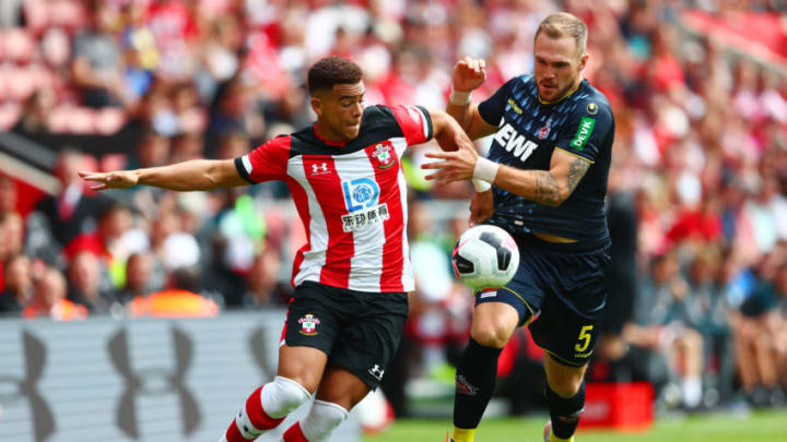 SOUTHAMPTON, ENGLAND – AUGUST 03: Che Adams of Southampton battles for the ball with Rafael Czichos of 1.FC Koln during the Pre-Season Friendly match between Southampton and FC Koln at St. Mary’s Stadium on August 03, 2019 in Southampton, England. (Photo by Dan Istitene/Getty Images)