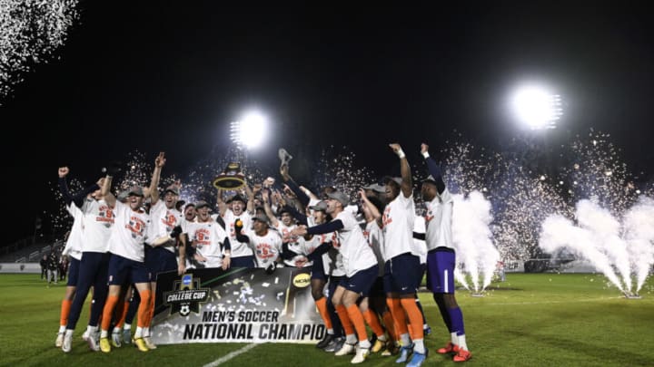 CARY, NORTH CAROLINA - DECEMBER 12: The Syracuse Orange celebrate their win over the Indiana Hoosiers for the Division I Men’s Soccer Championship at Sahlen's Stadium at WakeMed Soccer Park on December 12, 2022 in Cary, North Carolina. (Photo by Eakin Howard/Getty Images)