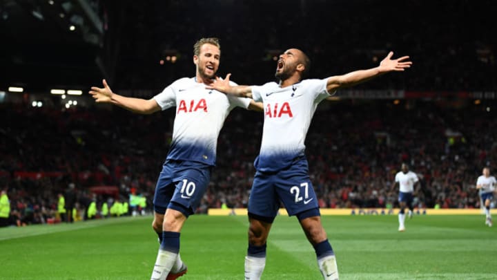MANCHESTER, ENGLAND - AUGUST 27: Lucas Moura of Tottenham Hotspur celebrates with Harry Kane of Tottenham Hotspur after scoring his second goal and his team's third goal during the Premier League match between Manchester United and Tottenham Hotspur at Old Trafford on August 27, 2018 in Manchester, United Kingdom. (Photo by Clive Mason/Getty Images)