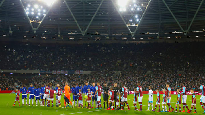 West Ham and Chelsea teams head out onto the pitch (Photo by Nick Potts/PA Images via Getty Images)
