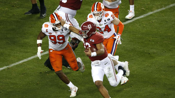 SANTA CLARA, CALIFORNIA – JANUARY 07: Clelin Ferrell #99 of the Clemson Tigers tackles Tua Tagovailoa #13 of the Alabama Crimson Tide on fourth down during the fourth quarter in the College Football Playoff National Championship at Levi’s Stadium on January 07, 2019 in Santa Clara, California. (Photo by Lachlan Cunningham/Getty Images)