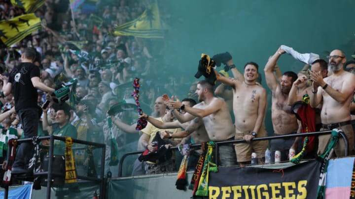 PORTLAND, OREGON - JUNE 11: Portland Timbers fans celebrate after Franck Boli #7 of the Portland Timbers scores a goal during the first half against the FC Dallas at Providence Park on June 11, 2023 in Portland, Oregon. (Photo by Soobum Im/Getty Images)