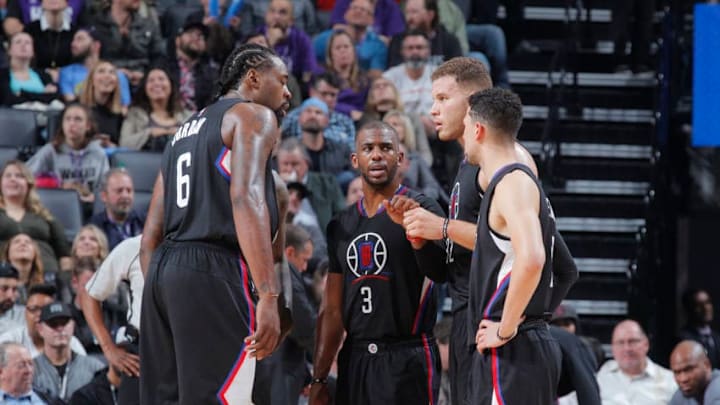 SACRAMENTO, CA - NOVEMBER 18: DeAndre Jordan #6, Chris Paul #3, Blake Griffin #32 and J.J. Redick #4 of the Los Angeles Clippers huddle during the game against the Sacramento Kings on November 18, 2016 at Golden 1 Center in Sacramento, California. NOTE TO USER: User expressly acknowledges and agrees that, by downloading and or using this photograph, User is consenting to the terms and conditions of the Getty Images Agreement. Mandatory Copyright Notice: Copyright 2016 NBAE (Photo by Rocky Widner/NBAE via Getty Images)