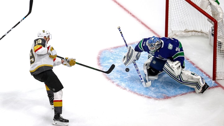 Reilly Smith #19 of the Vegas Golden Knights attempts a shot on Thatcher Demko #35 of the Vancouver Canucks during the first period in Game Six
