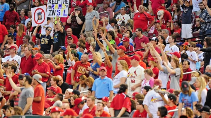 May 29, 2015; St. Louis, MO, USA; St. Louis Rams fans hold up signs in support of keeping the Rams in St. Louis during the third inning of a game between the Los Angeles Dodgers and the St. Louis Cardinals at Busch Stadium. Mandatory Credit: Jeff Curry-USA TODAY Sports