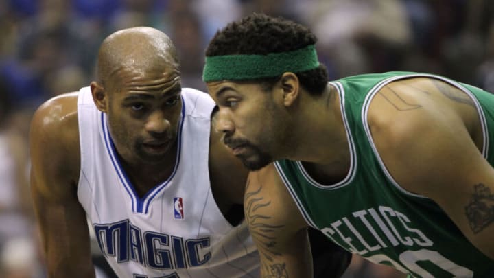 ORLANDO, FL - MAY 16: Vince Carter #15 of the Orlando Magic lines up next to Rasheed Wallace #30 of the Boston Celtics as they wait for a free throw attempt in Game One of the Eastern Conference Finals during the 2010 NBA Playoffs at Amway Arena on May 16, 2010 in Orlando, Florida. NOTE TO USER: User expressly acknowledges and agrees that, by downloading and/or using this Photograph, user is consenting to the terms and conditions of the Getty Images License Agreement. (Photo by Doug Benc/Getty Images)