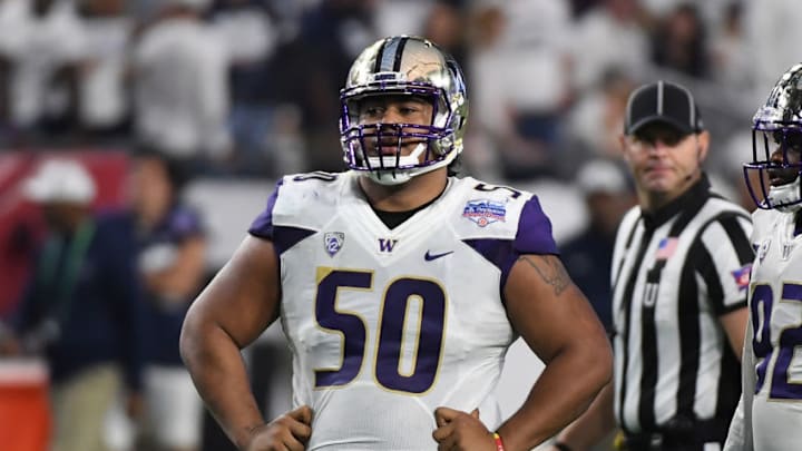GLENDALE, AZ - DECEMBER 30: Vita Vea #50 of the Washington Huskies looks across the line of scrimmage prior to a play against the Penn State Nittany Lions during the Playstation Fiesta Bowl at University of Phoenix Stadium on December 30, 2017 in Glendale, Arizona. (Photo by Norm Hall/Getty Images)