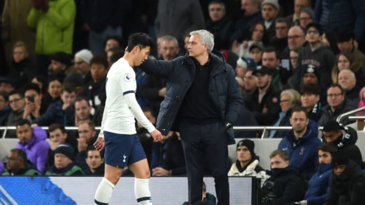 LONDON, ENGLAND - DECEMBER 22: Heung-Min Son of Tottenham Hotspur walks past Jose Mourinho, Manager of Tottenham Hotspur after being shown a red card during the Premier League match between Tottenham Hotspur and Chelsea FC at Tottenham Hotspur Stadium on December 22, 2019 in London, United Kingdom. (Photo by Michael Regan/Getty Images)