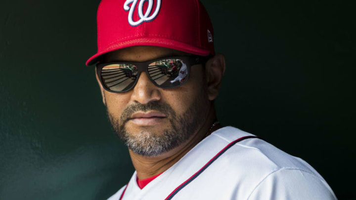WASHINGTON, DC - JULY 24: Manager Dave Martinez #4 of the Washington Nationals looks on against the Colorado Rockies during the third inning of game one of a doubleheader at Nationals Park on June 24, 2019 in Washington, DC. (Photo by Scott Taetsch/Getty Images)
