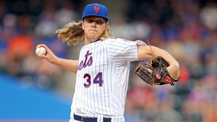 Jul 8, 2016; New York City, NY, USA; New York Mets starting pitcher Noah Syndergaard (34) pitches against the Washington Nationals during the first inning at Citi Field. Mandatory Credit: Brad Penner-USA TODAY Sports