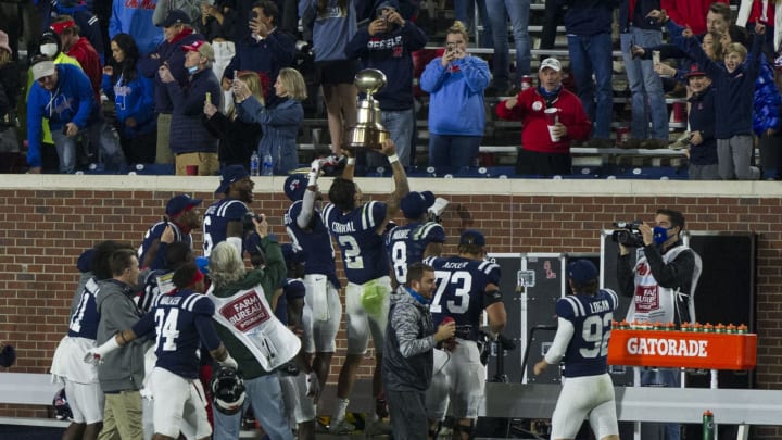 Nov 28, 2020; Oxford, Mississippi, USA; Mississippi Rebels players celebrate after the game against the Mississippi State Bulldogs at Vaught-Hemingway Stadium. Mandatory Credit: Justin Ford-USA TODAY Sports