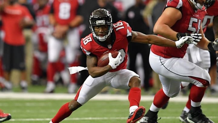 Nov 27, 2016; Atlanta, GA, USA; Atlanta Falcons wide receiver Taylor Gabriel (18) runs for a touchdown against the Arizona Cardinals during the second quarter at the Georgia Dome. Mandatory Credit: Dale Zanine-USA TODAY Sports