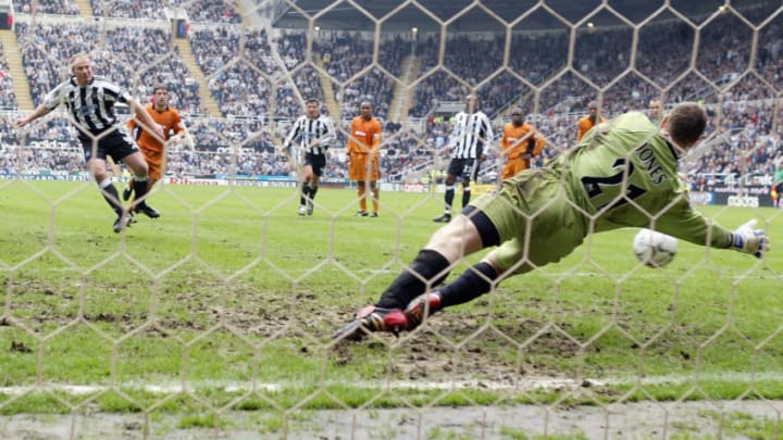 NEWCASTLE, ENGLAND - MAY 9: Alan Shearer of Newcastle has his penalty saved by Paul Jones of Wolves during the FA Barclaycard Premiership match between Newcastle United and Wolverhampton Wanderers at St. James Park on May 9, 2004 in Newcastle, England. (Photo by Laurence Griffiths/Getty Images)