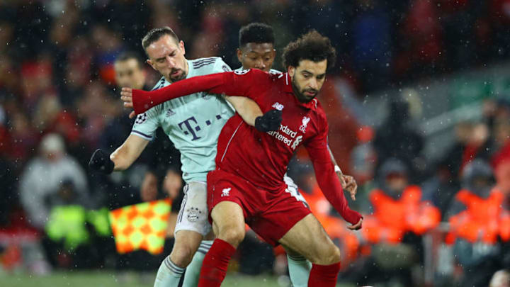 LIVERPOOL, ENGLAND - FEBRUARY 19: Mohamed Salah of Liverpool battles with Franck Ribery and David Alaba of Bayern Munich during the UEFA Champions League Round of 16 First Leg match between Liverpool and FC Bayern Muenchen at Anfield on February 19, 2019 in Liverpool, England. (Photo by Clive Brunskill/Getty Images)