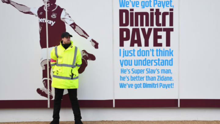 LONDON, ENGLAND – JANUARY 14: A steward guards the Dimitri Payet of West Ham United sign outside the stadium prior to the Premier League match between West Ham United and Crystal Palace at London Stadium on January 14, 2017 in London, England. (Photo by Shaun Botterill/Getty Images)