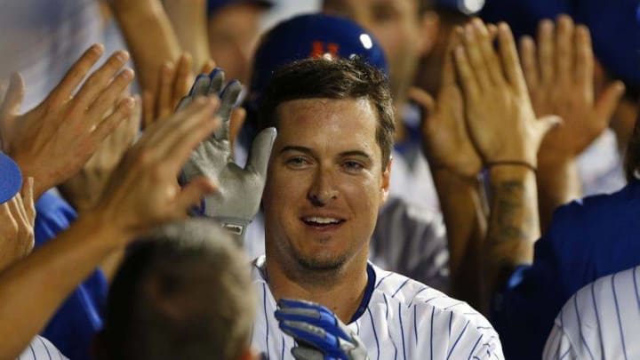 Aug 27, 2016; New York City, NY, USA; New York Mets third baseman Kelly Johnson (55) celebrates with teammates after hitting a grand slam in the seventh inning against the Philadelphia Phillies at Citi Field. Mandatory Credit: Noah K. Murray-USA TODAY Sports