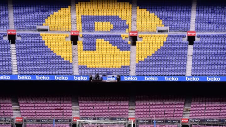 Spectator tribunes remain empty as the Spanish league football match FC Barcelona vs UD Las Palmas is played behind closed doors at the Camp Nou stadium in Barcelona on October 1, 2017.Barcelona's La Liga match against Las Palmas was played behind closed doors after the Spanish league refused to postpone the match. At least 91 people have been injured in clashes between police and activists in Catalonia over an independence referendum for the region deemed illegal by the Spanish government. / AFP PHOTO / JOSE JORDAN (Photo credit should read JOSE JORDAN/AFP via Getty Images)