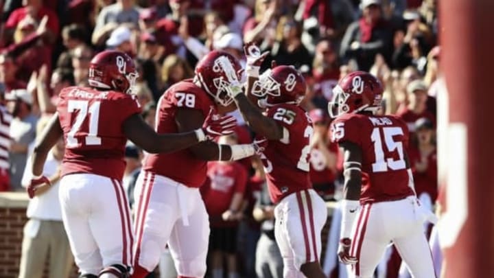 Nov 12, 2016; Norman, OK, USA; Oklahoma Sooners running back Joe Mixon (25) celebrates with teammates after scoring a touchdown during the second half against the Baylor Bears at Gaylord Family – Oklahoma Memorial Stadium. Mandatory Credit: Kevin Jairaj-USA TODAY Sports