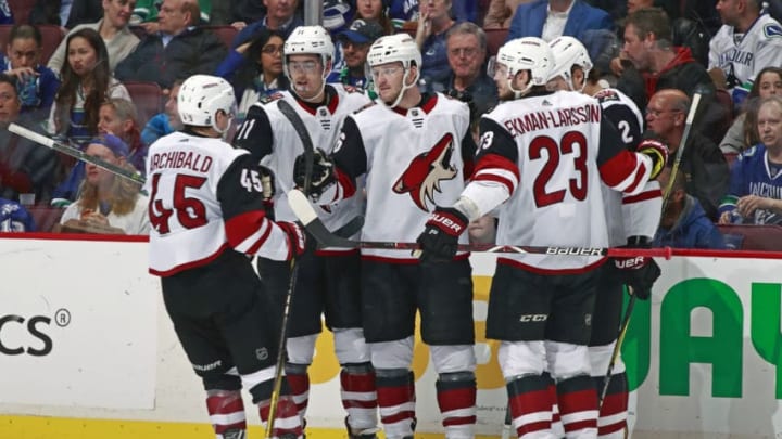 VANCOUVER, BC - APRIL 5: Christian Fischer #36 of the Arizona Coyotes is congratulated by teammates after scoring during their NHL game against the Vancouver Canucks at Rogers Arena April 5, 2018 in Vancouver, British Columbia, Canada. (Photo by Jeff Vinnick/NHLI via Getty Images)