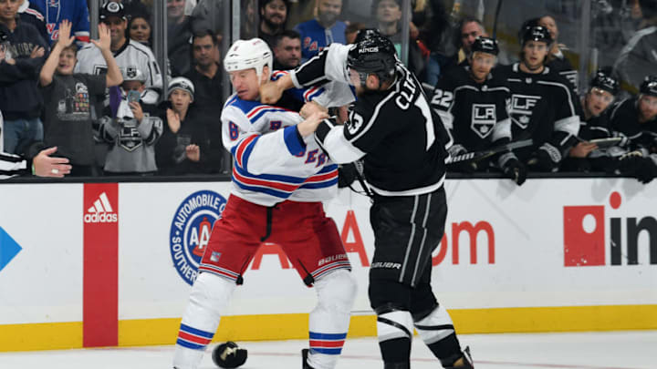LOS ANGELES, CA - OCTOBER 28: Kyle Clifford #13 of the Los Angeles Kings lands a punch while fighting Cody McLeod #8 of the New York Rangers during the first period of the game at STAPLES Center on October 28, 2018 in Los Angeles, California. (Photo by Noah Graham/NHLI via Getty Images)