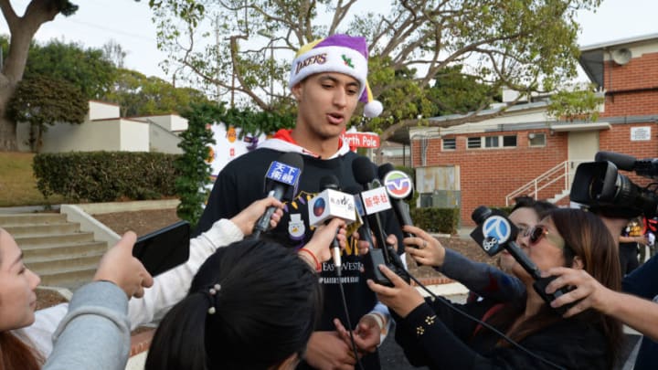 EL SEGUED, CA - DECEMBER 16: Kyle Kuzma #0 of the Los Angeles Lakers and East West Bank conclude A Season of Giving with the annual Holiday Party for Kids in El Segundo, California. NOTE TO USER: User expressly acknowledges and agrees that, by downloading and or using this photograph, User is consenting to the terms and conditions of the Getty Images License Agreement. Mandatory Copyright Notice: Copyright 2017 NBAE (Photo by Andrew D. Bernstein/NBAE via Getty Images)