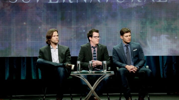 BEVERLY HILLS, CA - JULY 18: (L-R) Actor Jared Padalecki, producer Jeremy Carver, and actor Jensen Ackles speak onstage at the "Supernatural" panel during the CW Network portion of the 2014 Summer Television Critics Association at The Beverly Hilton Hotel on July 18, 2014 in Beverly Hills, California. (Photo by Frederick M. Brown/Getty Images)