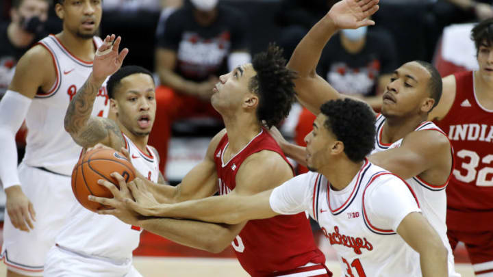 Feb 13, 2021; Columbus, Ohio, USA; Indiana Hoosiers forward Trayce Jackson-Davis (23) is defended by Ohio State Buckeyes guard CJ Walker (13) and forward Seth Towns (31) during the first half at Value City Arena. Mandatory Credit: Joseph Maiorana-USA TODAY Sports