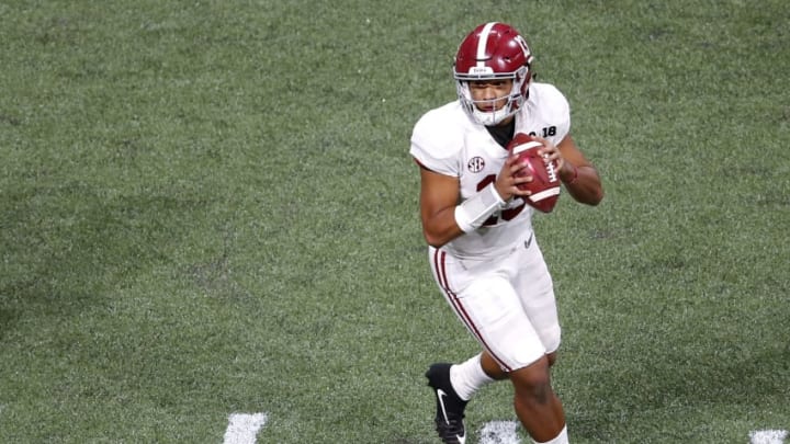 ATLANTA, GA - JANUARY 08: Quarterback Tua Tagovailoa #13 of the Alabama Crimson Tide drops back to pass during the College Football Playoff National Championship game against the Georgia Bulldogs at Mercedes-Benz Stadium on January 8, 2018 in Atlanta, Georgia. (Photo by Mike Zarrilli/Getty Images)
