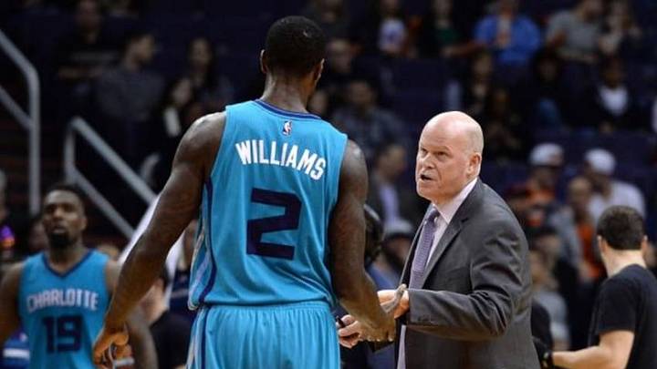 Jan 6, 2016; Phoenix, AZ, USA; Charlotte Hornets head coach Steve Clifford talks with forward Marvin Williams (2) during a time out against the Phoenix Suns at Talking Stick Resort Arena. Mandatory Credit: Jennifer Stewart-USA TODAY Sports