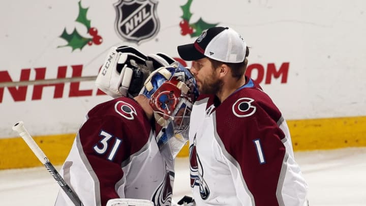 SUNRISE, FL - DECEMBER 6: Fellow Goaltenders Philipp Grubauer #31 and Semyon Varlamov #1 of the Colorado Avalanche celebrate their 5-2 win over the Florida Panthers at the BB&T Center on December 6, 2018 in Sunrise, Florida. (Photo by Eliot J. Schechter/NHLI via Getty Images)