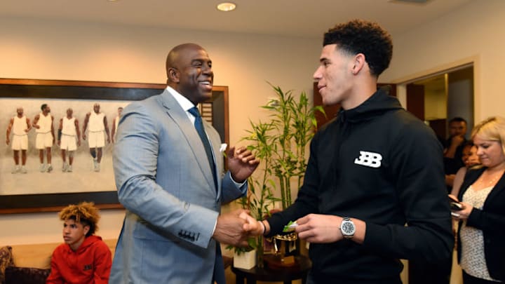 EL SEGUEDO, CA- JUNE 23: Lonzo Ball #2 of the Los Angeles Lakers shakes hands with President of Basketball Operation of the Los Angeles Lakers, Magic Johnson following a press conference to introduce Los Angeles Lakers 2017 NBA Draft picks in El Segundo, California. NOTE TO USER: User expressly acknowledges and agrees that, by downloading and or using this photograph, User is consenting to the terms and conditions of the Getty Images License Agreement. Mandatory Copyright Notice: Copyright 2016 NBAE (Photo by Andrew D. Bernstein/NBAE via Getty Images) EL SEGUEDO, CA- JUNE 23: Lonzo Ball #2 of the Los Angeles Lakers shakes hands with President of Basketball Operation of the Los Angeles Lakers, Magic Johnson following a press conference to introduce Los Angeles Lakers 2017 NBA Draft picks in El Segundo, California. NOTE TO USER: User expressly acknowledges and agrees that, by downloading and or using this photograph, User is consenting to the terms and conditions of the Getty Images License Agreement. Mandatory Copyright Notice: Copyright 2016 NBAE (Photo by Andrew D. Bernstein/NBAE via Getty Images)