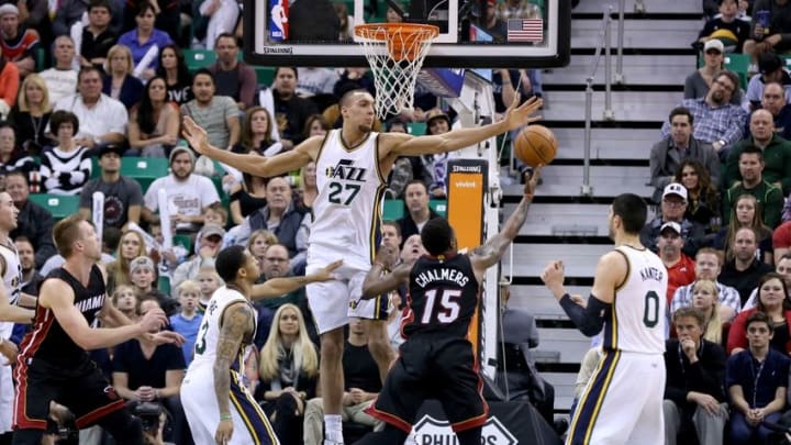 Dec 12, 2014; Salt Lake City, UT, USA; Utah Jazz center Rudy Gobert (27) tries to block the shot of Miami Heat guard Mario Chalmers (15) during the fourth quarter at EnergySolutions Arena. Miami Heat won the game 100-95. Mandatory Credit: Chris Nicoll-USA TODAY Sports
