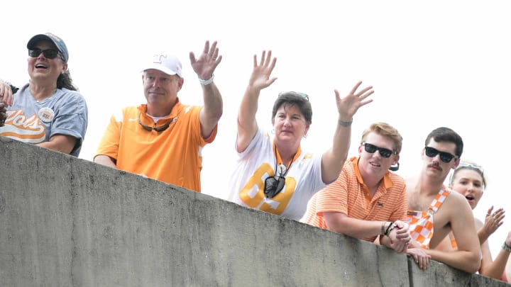 Tennessee fans wave as the team arrives to the stadium before a game at Ben Hill Griffin Stadium in Gainesville, Fla. on Saturday, Sept. 25, 2021.Kns Tennessee Florida Football