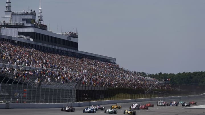 LONG POND, PA - JULY 6 : Drivers race down the front stretch at the start of the Pocono INDYCAR 500 at Pocono Raceway on July 6, 2014 in Long Pond, Pennsylvania. (Photo by Jeff Zelevansky/Getty Images)